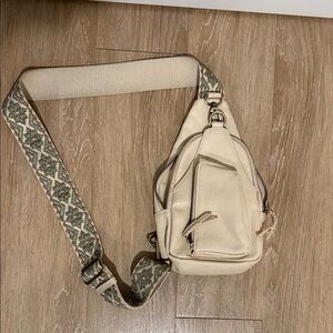 Stylish Cream Satchel with Patterned Strap
